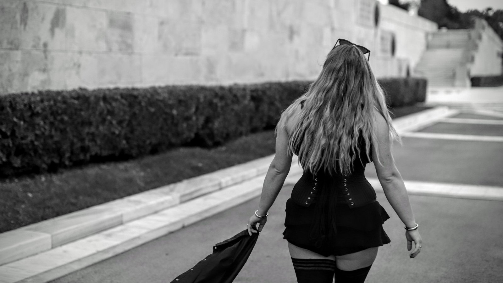 Rear view, corset outdoors; SFW